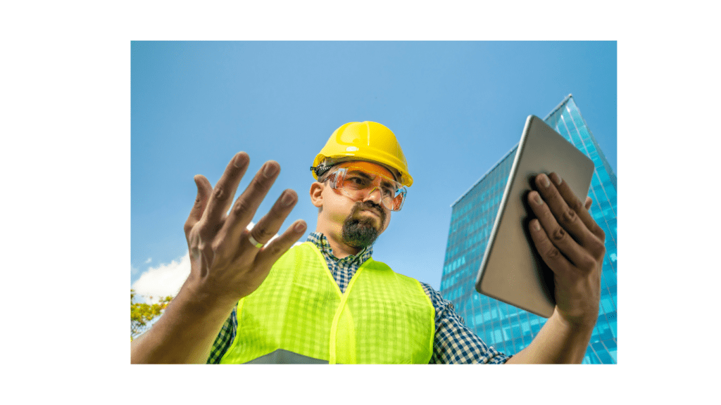 engineer with ipad and hardhad puzzled and frustrated
