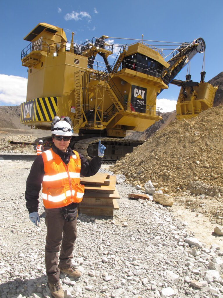 Frank Rojas on site working as a Field Service Engineer in the mountains