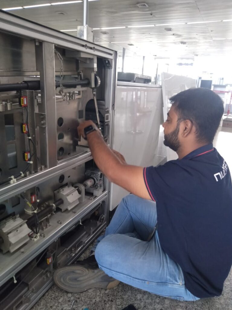 Dipankar Mondal fixing machine in airport