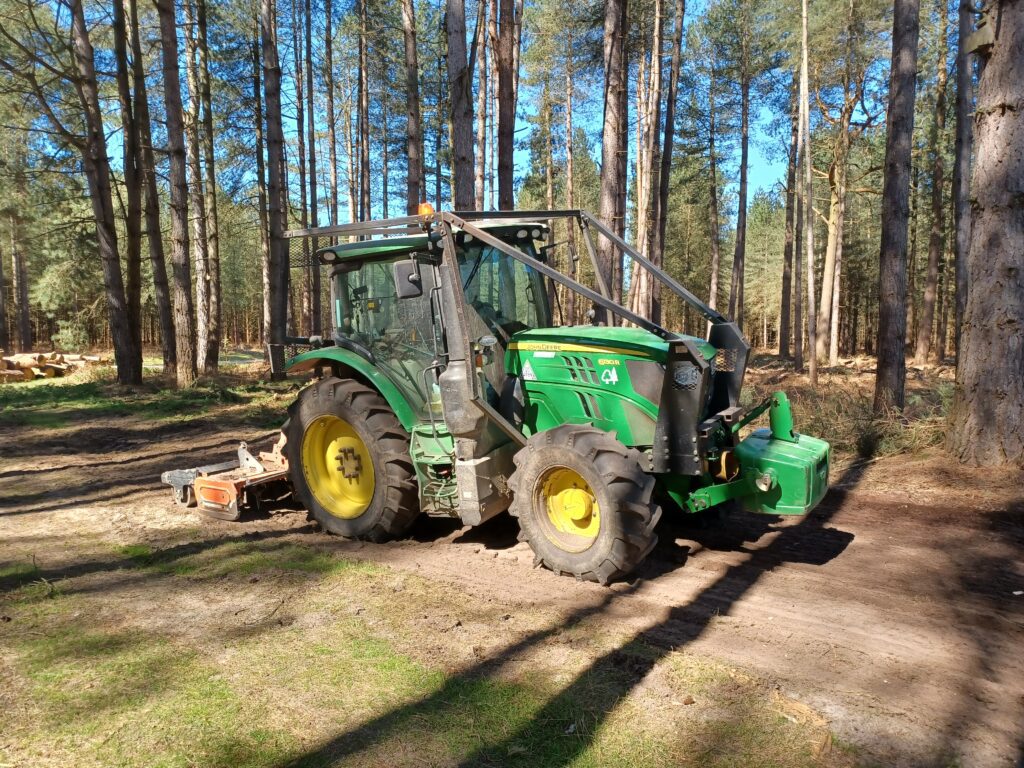 John Deere tractor working in the Forest.