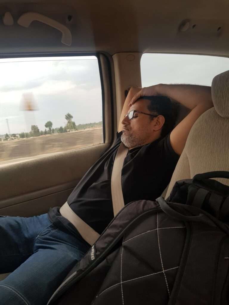 Ossama Elgammal asleep in car with service engineer kit bag