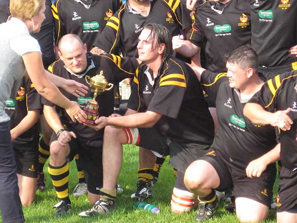 Richard Meredith with rugby team