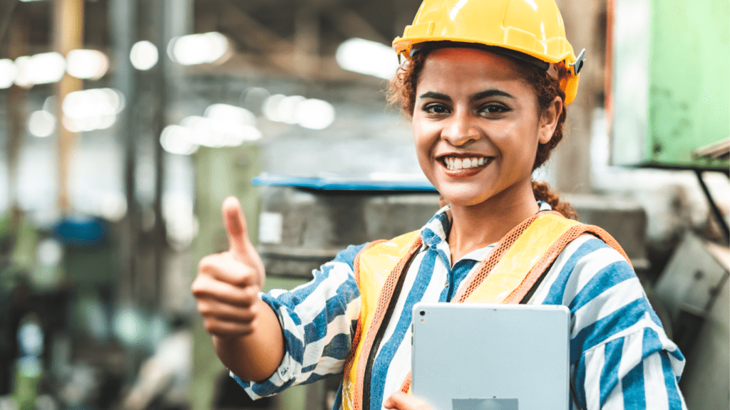 field service engineer woman smiling hard hat laptop