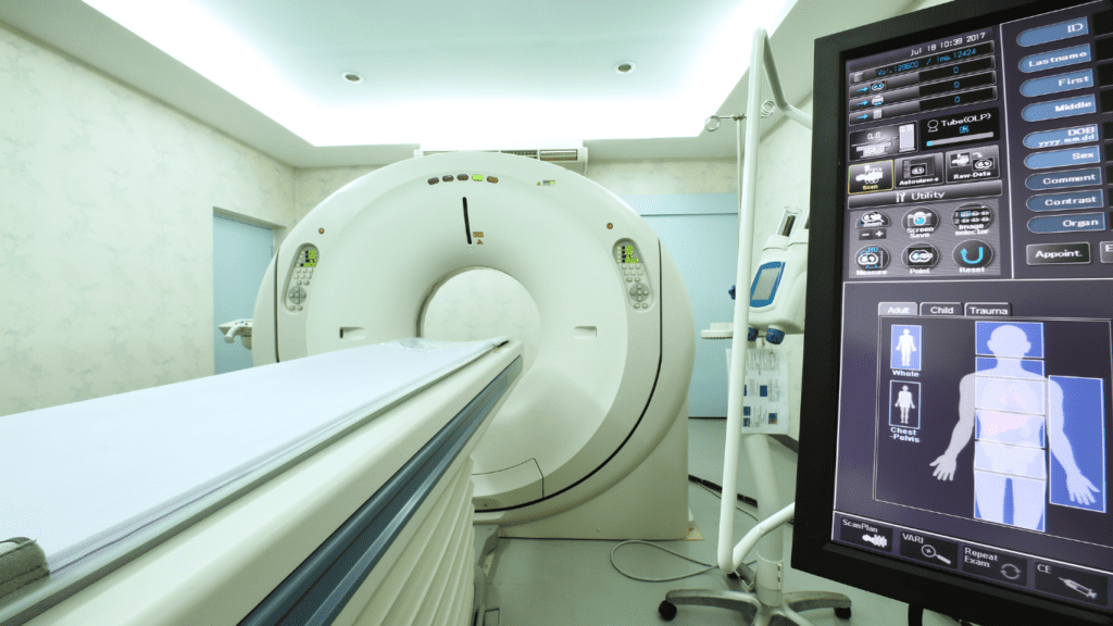 mri scanner with screen showing human