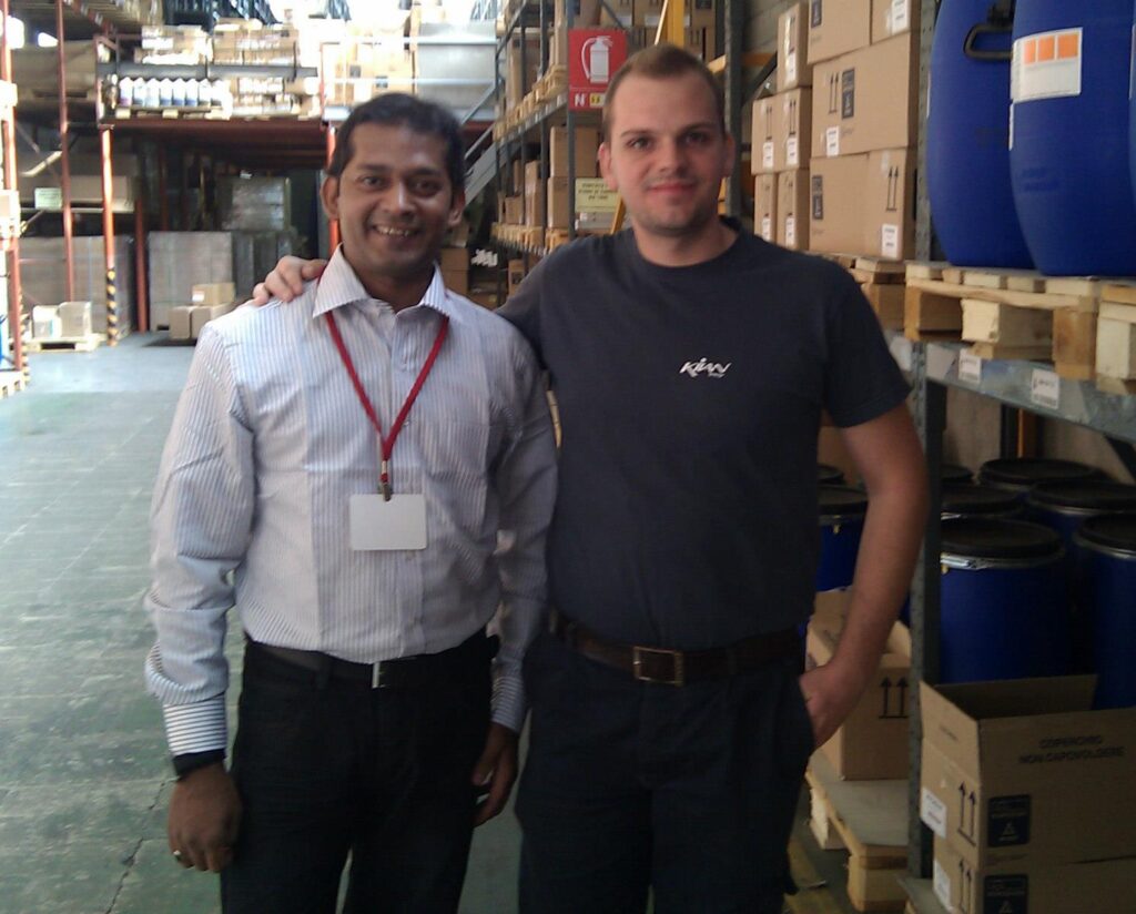 Navid Raza with colleague in warehouse