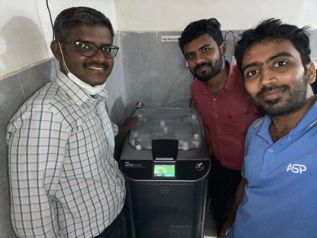 Sivakumar Field Service Engineer in India with colleagues and Aeroflex equipment