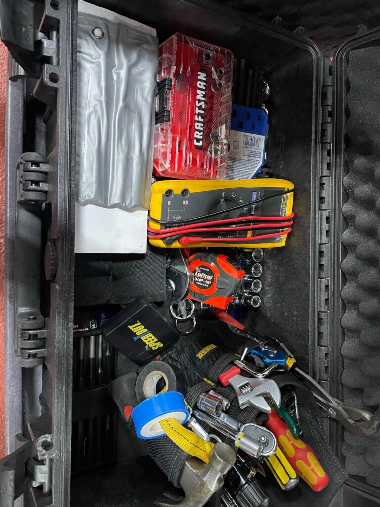Alvaro R Hernandez Mendez open tool box with field engineer tools