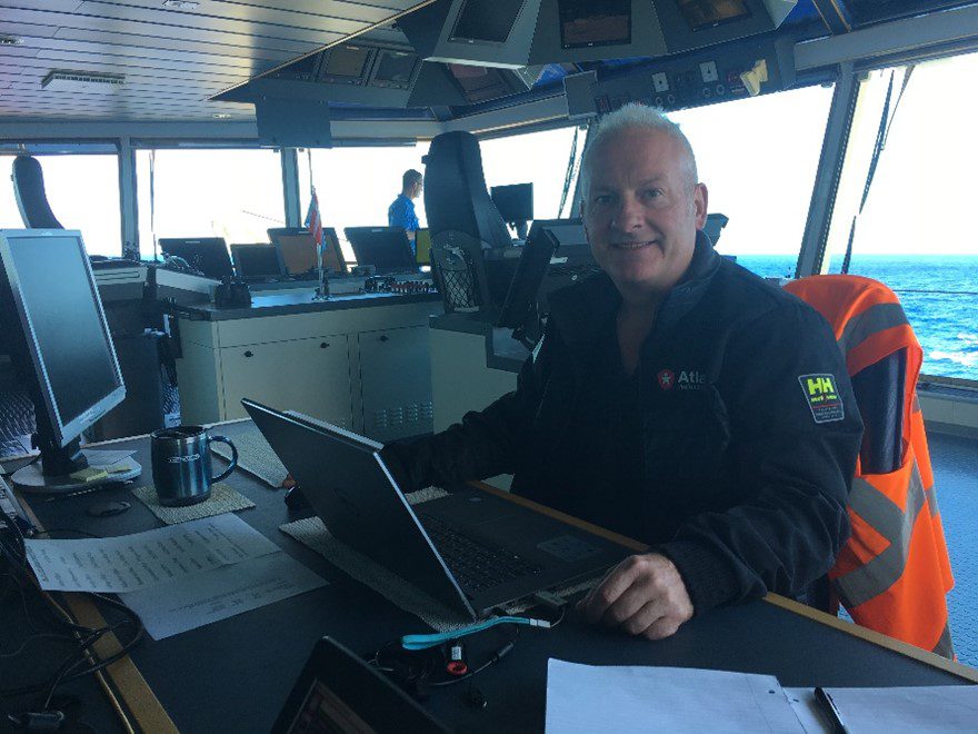 Gordon Foot, author of Allyship,  on on ship in control room