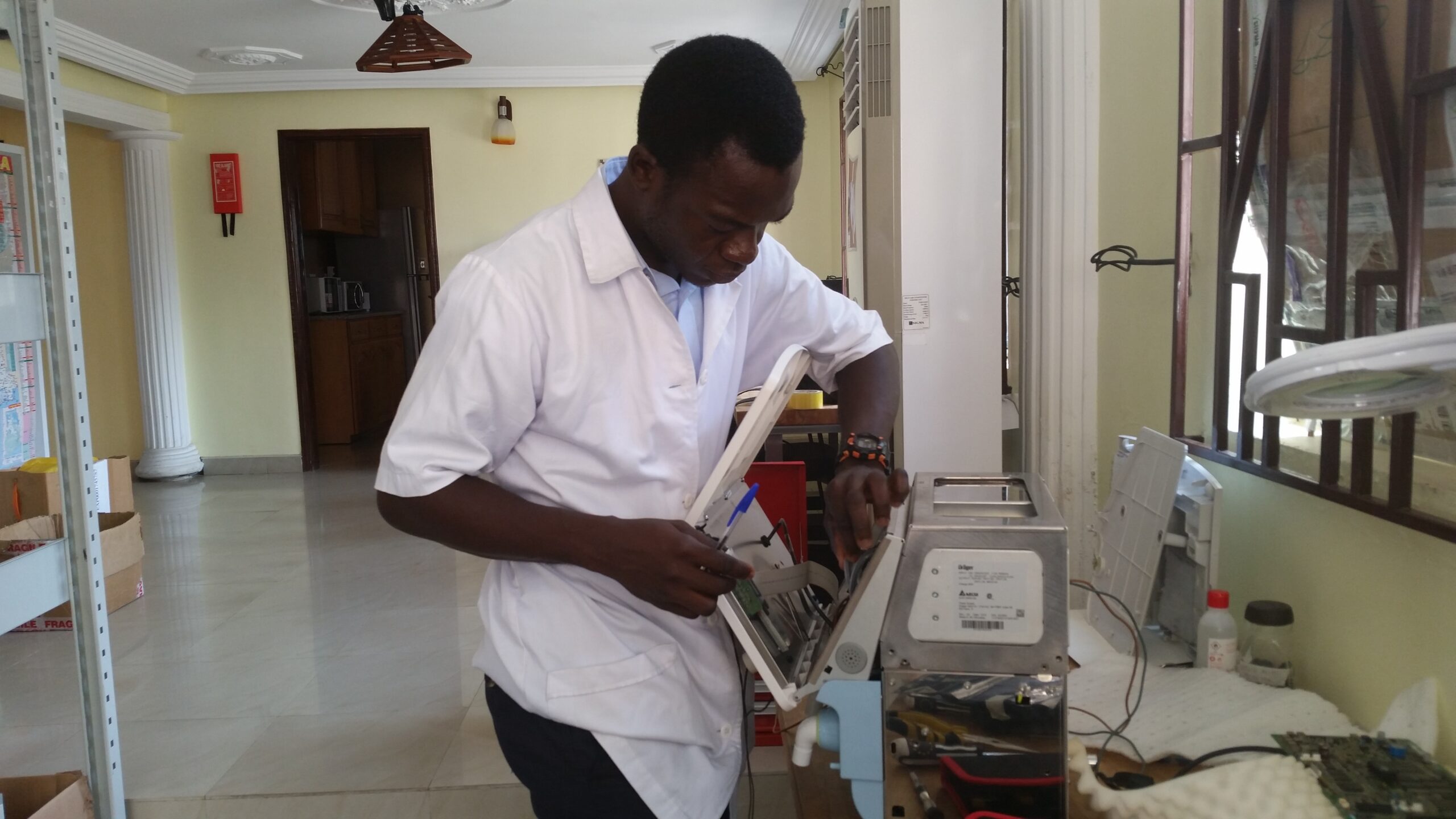 Alex Nii Nortey Dowuona, Biomedical Engineer working on medical equipment