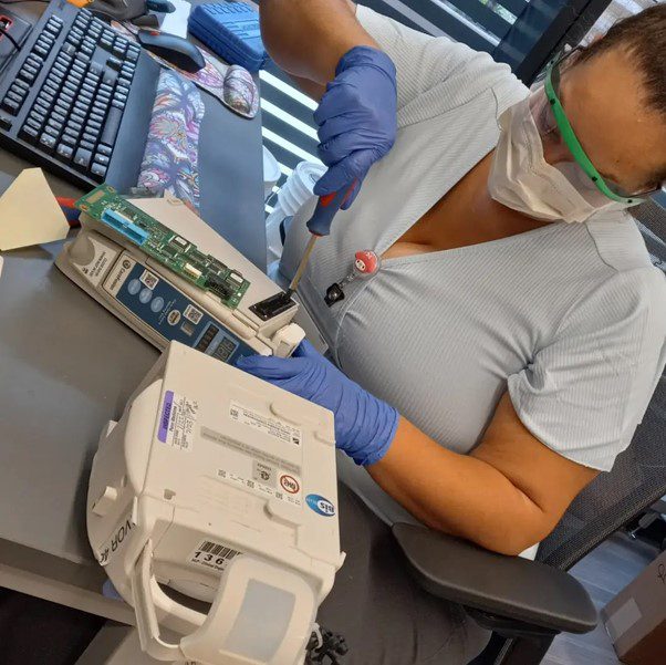 Nicole Ruffin Servicing IV Pump and Patient Monitor