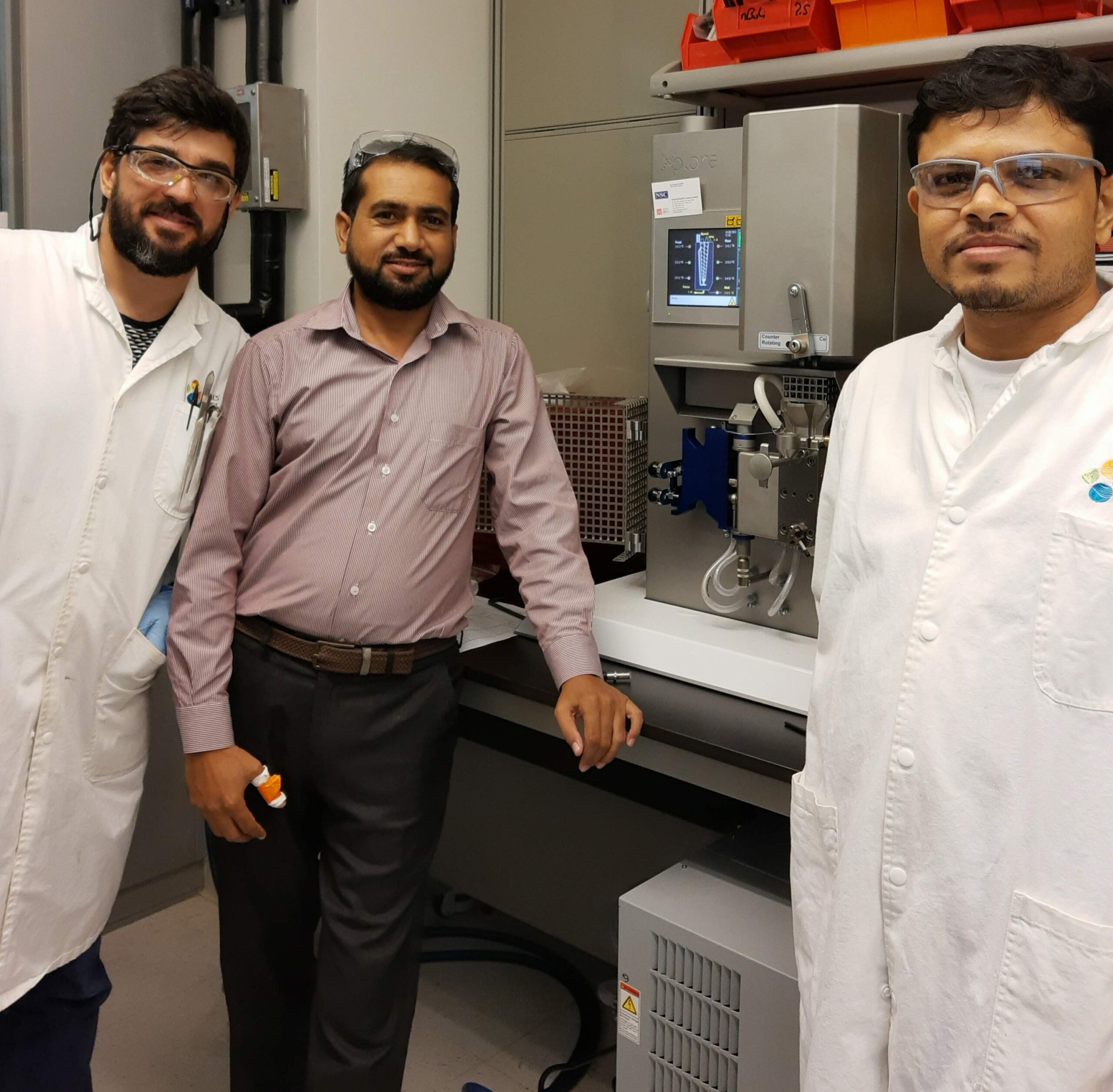 SYED INAYAT ALI SHAH with scientists and instrumentation and calibration equipment