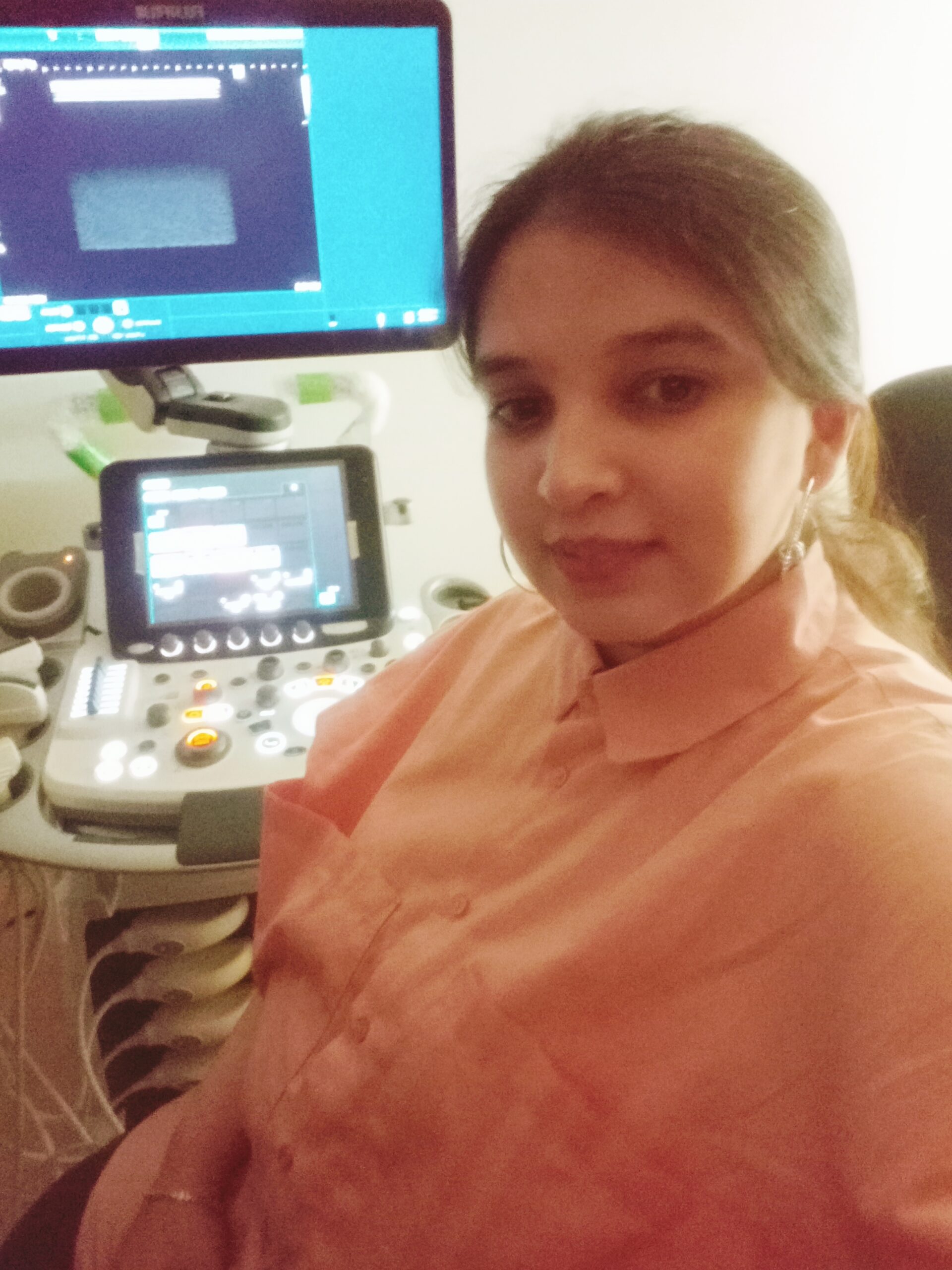Syeda Ghazia FUJIFILM at scanner working as a woman medical equipment engineer