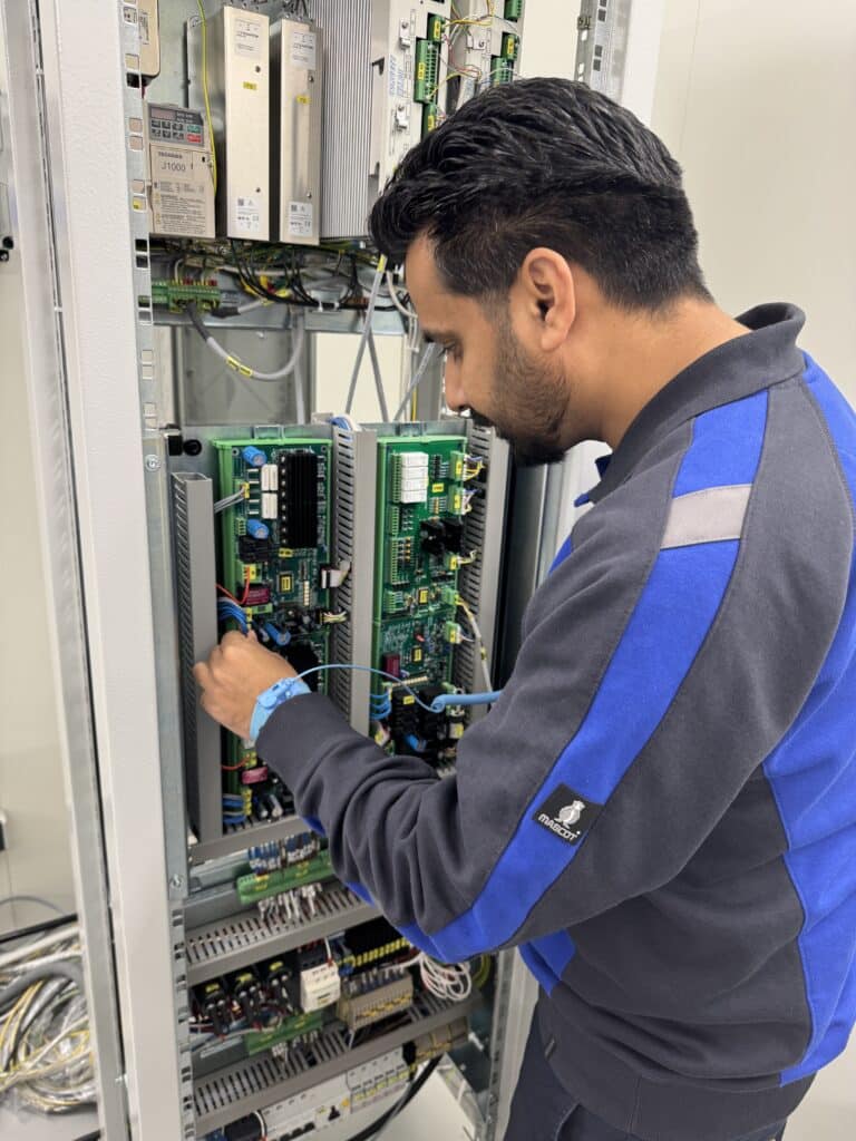 Varun Sharma working on electronics of a medical device