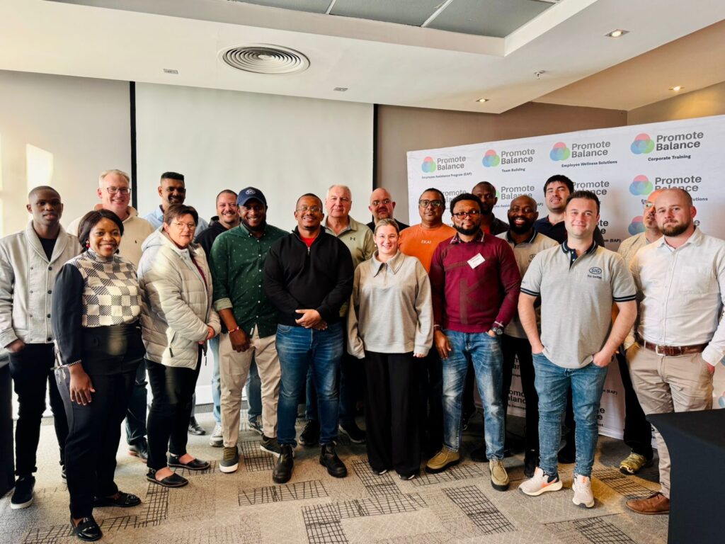 michael Onwukwe packaging manufacturing field engineer with colleagues at SIG