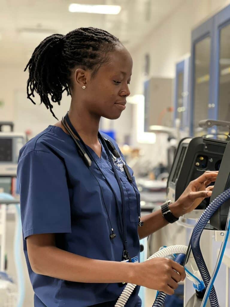 Deborah Geneugelijk Nutsugah volunteering on Mercy Ships servicing medical equipment
