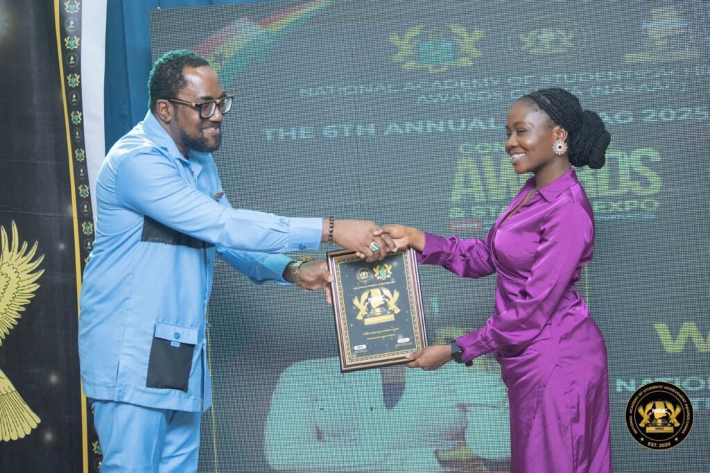 Linda Akosua Essilfie woman biomedical engineering graduate receiving a leadership award