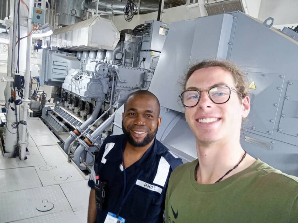 Ekele John Electrical and Electronics Engineer in engine room Global Mercy Ship with colleague