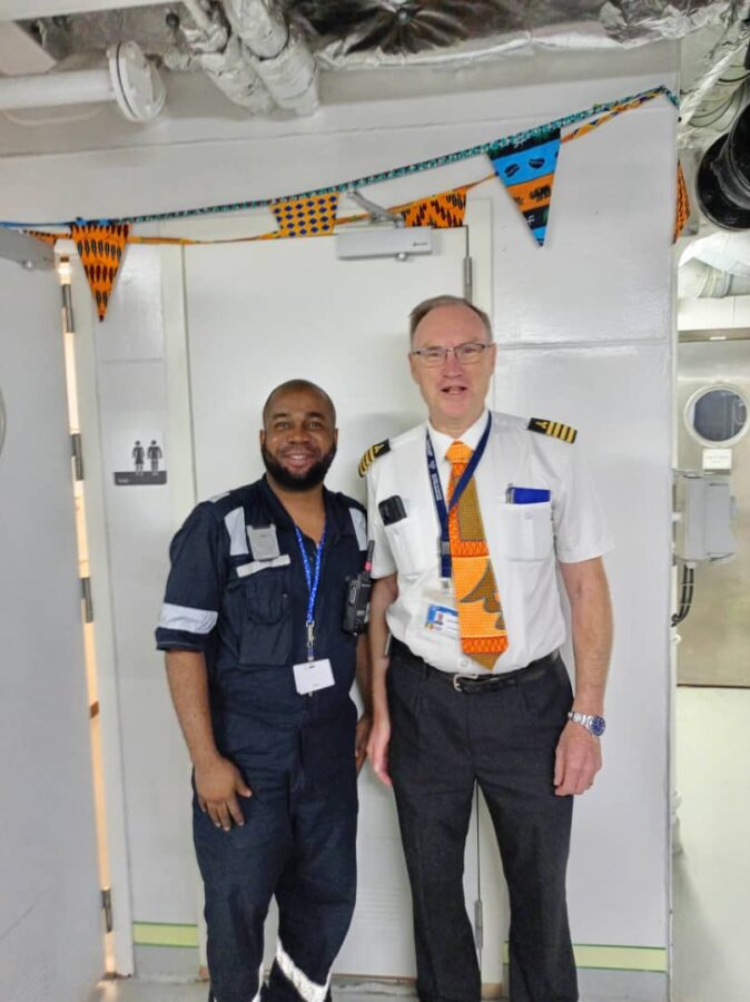 Ekele John Electrical and Electronics Engineer on board Global Mercy ship with the Chief Engineer