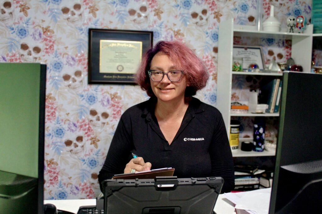 Robin Deal Chem Aqua at work desk