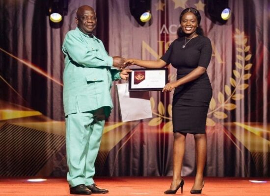 Victoria-Mends-receiving-award-e1720007939218